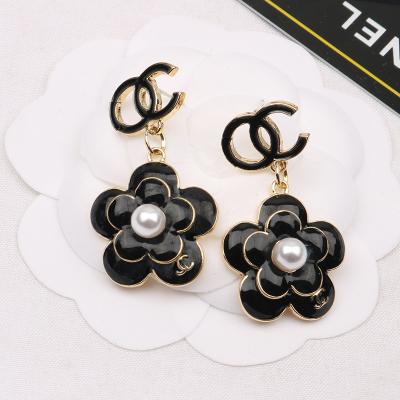 China 2021 New Trendy Luxury Camellia Cute Fashion Pearl Earring Silver Designer Earrings for sale