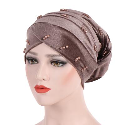 China Turban New Hijab Designs 2021 Solid Color Muslim Turbans Femm Velvet Turban Headband Pearl Muslim Hats For Women for sale