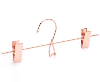 China Clip Rose Gold Metal Hanger With Copper Clips Metal Pants Hanger for sale