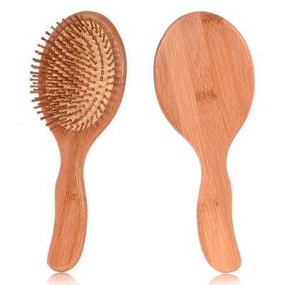 China Environmental protection and health bamboo airbag massage comb carbonized solid wood anti-static cushion hair brush hair combs for sale