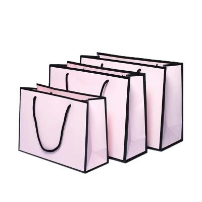 China Recyclable Custom Clothes Paper Bags Gifts Shopping Cosmetics Fashion Three-Dimensional High-end Handbag for sale