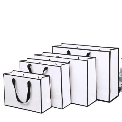 China Customized Recyclable Logo Kraft Shopping Bag Paper Bag Handbag Packaging Wholesale Cheap Price Gift Paper Bag for sale