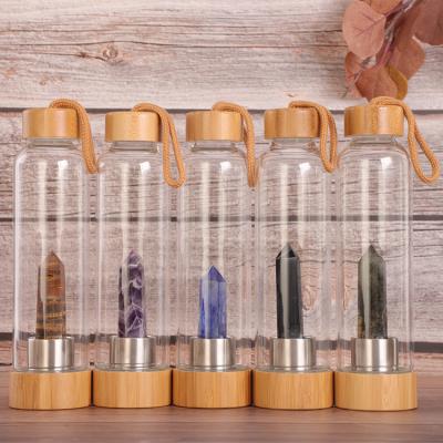 China Stored Elixir Water Bottle for Gemstone Healing, Rose Quartz Chip Tumbled Stone Glass Water Bottle, Crystal Water Bottle for sale