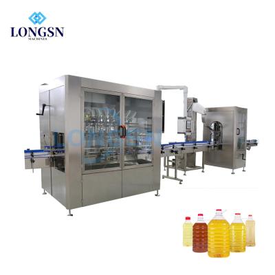 China High precision full automatic level sunflower filling/edible engine oil bottle filling/sesame engine filling and packing machine for sale