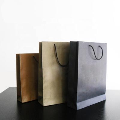 China Recyclable Luxury Paper Bags Customized Shopping Colorful Print Kraft Paper Bag with Handles for sale