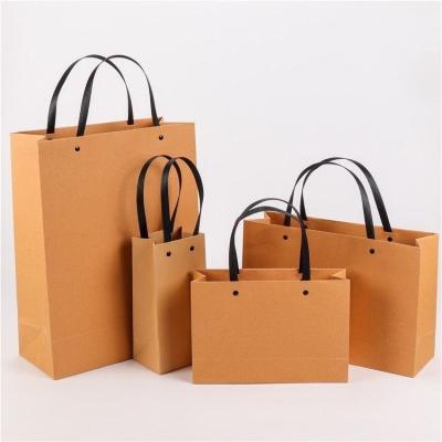 China Recyclable Chamepak Recyclable Kraft Paper Bag with Twist Handle Reusable Shopping Paper Bag Logo Printing Brown Packaging Bag for sale