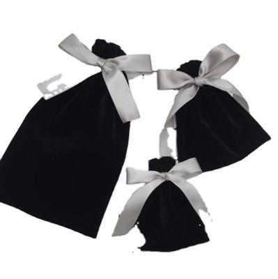 China Recyclable Hot product candy jewelry black velvet drawstring bag with silk ribbon for sale