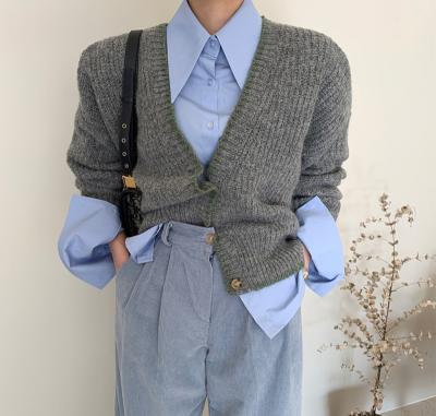 China Anti-Wrinkle OEM Ladies Cozy Ribbed Cardigan with Button Fancy Women's V-Neckline Easy-to-Wear Essential Knitwear for sale