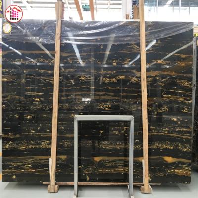 China Black and Gold Natural Marble Tile for Flooring and Wall Decor Dragon Marble Big Silver Gold Slabs for sale