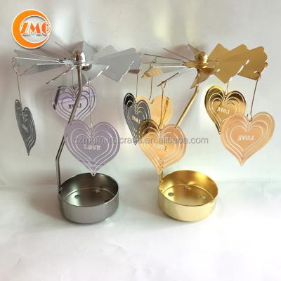 China Wholesale Hot Cheap Rotary Rotating Metal Heart Tea Light Candle Holders for sale