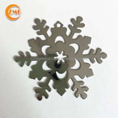 China Wholesale Cheap Laser Cut Europe Christmas Gifts Silver Metal Snowflake Bookmarks for sale