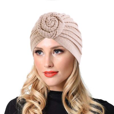 China DecorateÂ   Amazon Autumn Women Muslim Knotted Plain Warm Beanie Twisty Hair Turban Cotton Top Cap Hat for sale