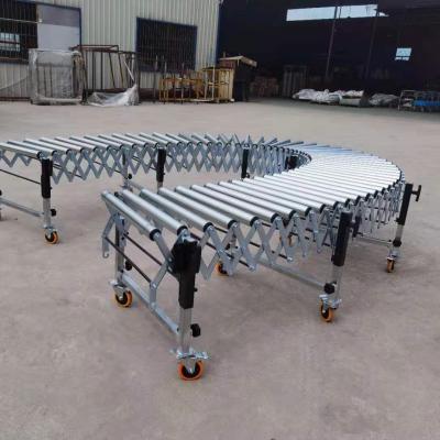 China Heat Resistant Unpowered Roller Sliding Line, Goods Unloading Artifact, Roller Conveyor, Telescopic Hose for sale