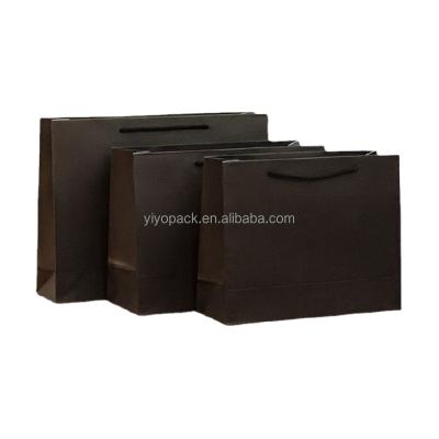 China Recyclable Custom Printed Plain Paper Bags 100gsm Brown Kraft Paper Bags With Rope Paper Handles for sale