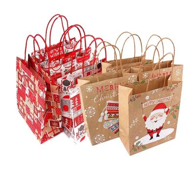 China Recycled Materials Christmas Paper Gift Bag Kraft Paper Bag With Handle Santa Claus Bag Christmas Decorations For Christmas Home Gift Box for sale