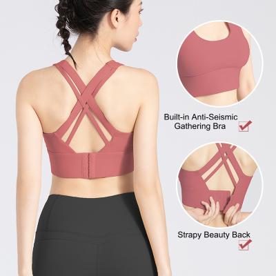 China Breathable Strappy Yoga Bra Middle Back Beauty Support Padded Removable Sports Bra Anti-Seismic Yoga Sports Gathered Running Bra for sale