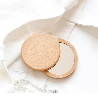 China Mini Makeup Mirror Mini Compact Portable Cosmetic Mirror Wooden Pocket Around Folding Simplicity for sale