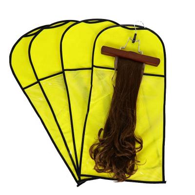 China Dustproof Printed Non-woven Wooden Bag Logo Wig Dust Cover Clip Wig Storage Bag Spot Yellow for sale