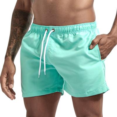 China Anti-wrinkle summer hot sexy fashion beach breathable pants black plus size shorts pockets swimming trunks high quality fitness shorts for sale