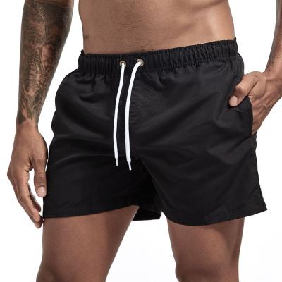 China European Anti-wrinkle brand designer beach pants and trunks sexy men's swimming style American fashion solid color shorts for sale