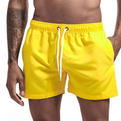 China 100% Polyester Anti-Wrinkle Men's Shorts Spot Factory Direct Sales Wholesale High Quality Solid Color Plus Size Beach Gym Swimming Shorts for sale