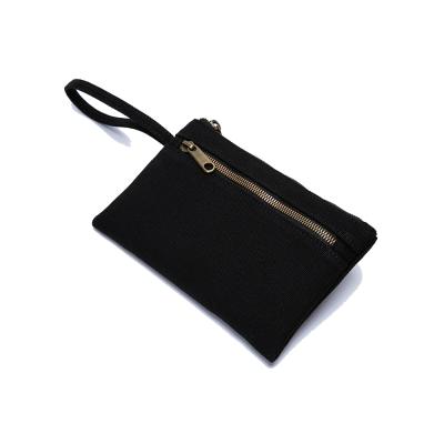 China New Canvas Classic Simple Female Storage Bag Casual Organic Canvas Wrist Bag 19*1*13cm for sale