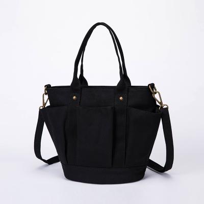 China High Quality Classic Canvas Saddle Bag Vintage Fashion Simple Organic Bag Storage and Canvas Tote Bag for sale