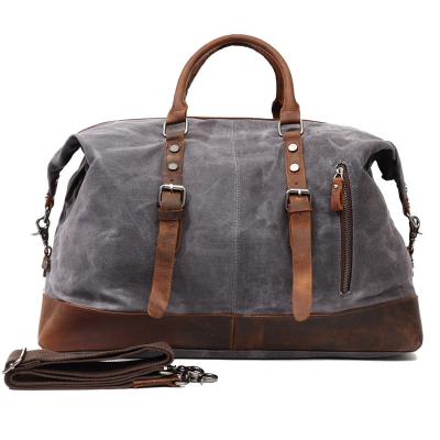 China Wax Canvas Messenger Bags Vintage Large Capacity Eco-friendly Waterproof Duffel Bag With Genuine Leather For Travel for sale