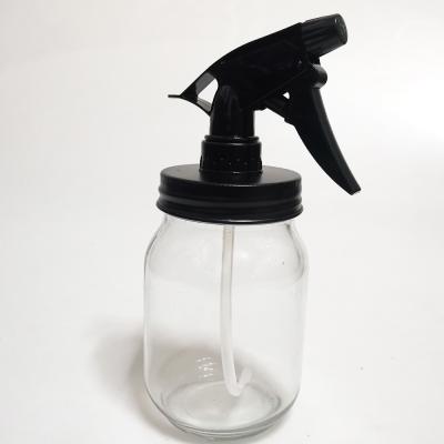 China Clear 16oz Modern Glass Mason Jar With Black Plastic Trigger Sprayer Head for sale