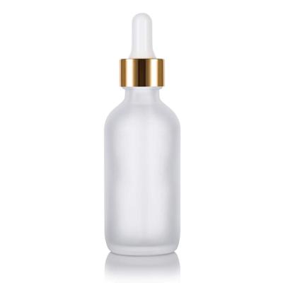 China 60ml Chemical Frosted Clear Boston Glass Round Bottle With Gold Metal And Glass Dropper for sale