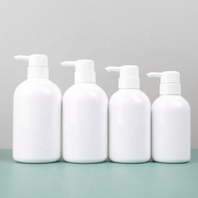 China Shoulder Cosmetic Round Refillable Pump Bottle Shampoo Body Wash Shower Gel Plastic Container 300ml 400ml 500ml 600ml for sale