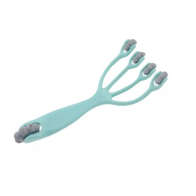 China Personal Care Four Claw Mini Portable Handheld Plastic Scalp Roller Head Massager Acupoint Massage Relieve Fatigue for sale