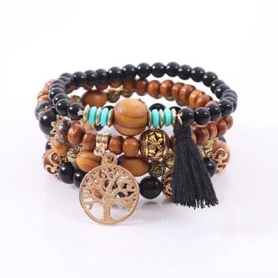 China Lead and Nickel Free Bohemian Wooden Tree of Life Acorn Tibetan Buddhism Prayer Crystal Bead Mara Bracelet for sale