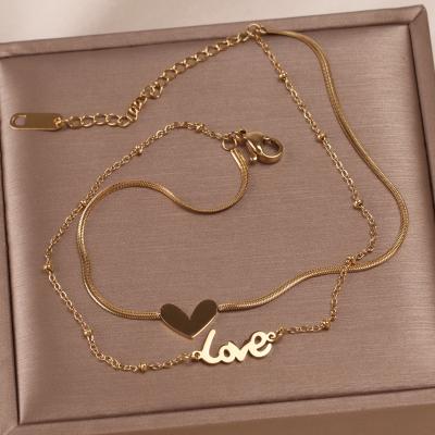 China 2020 new fashion CLASSIC titanium double love steel anklet chain for women anti allergy plating 14K gold foot accessories wild simple anklet chain for sale