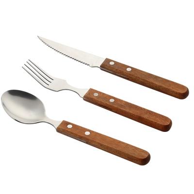 China Stocked Silverware Flateware Dinner Spoon And Fork Knife 304 Stainless Steel Cutlery Set With Wooden Handle for sale