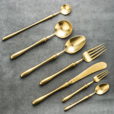 China Luxury Royal Wedding Stocked Stainless Steel Rose Gold Plated Cutlery With Dessert Spoon Ice Cream Spoon And Fork for sale