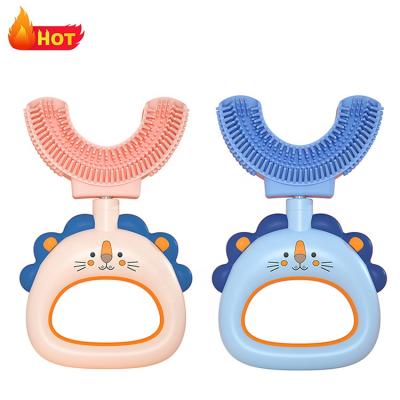 China JMK Cute Smart Baby Cartoon Little Lion Tooth Brush Kids Cute Silicone U-shaped Toothbrush For Children for sale