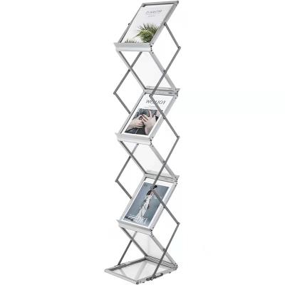 China Morden Customized 2022 Latest Design Trend Style Floor-standing Foldable Magazine Display Rack Photo Props Nordic Vertical Shelf for sale