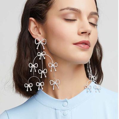 China Fashion Japanese Kimura Mitsuki with the same exaggerated long silver multi-bow tassel bow earrings needle dangling earrings for sale