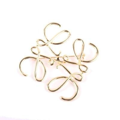 China Honey European alloy necklace and American temperament minimalist classic wild brooch fashion abstract art metal brooch for sale