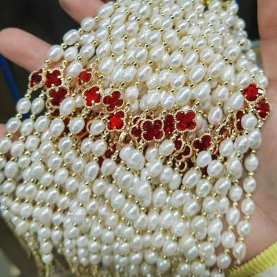 China New arrival FASHIONABLE ine freshwater pearl beaded bracelet four leaf clover handmade pearl bracelet female jewelry for sale