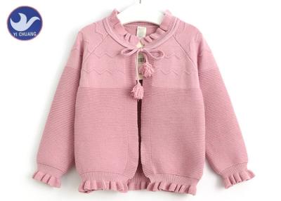 Chine Cardigan rose de tricotage d'enfants de vague de filles de manteau de chandail d'enfants de fermeture de bandage de boule à vendre