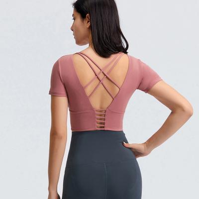 China El cortocircuito trasero de la cruz de la belleza envuelve las camisas rellenadas Logo Yoga Top Ladies de encargo del entrenamiento de la cosecha en venta