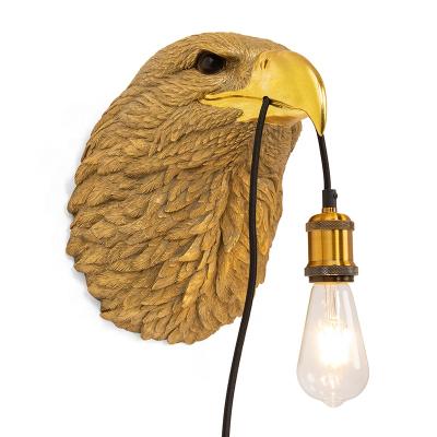 China Home Decor EUROPEAN Eagle Head Gold Figurine, Resin Head Statue, Hawk Figurine Lamp On Wall for sale