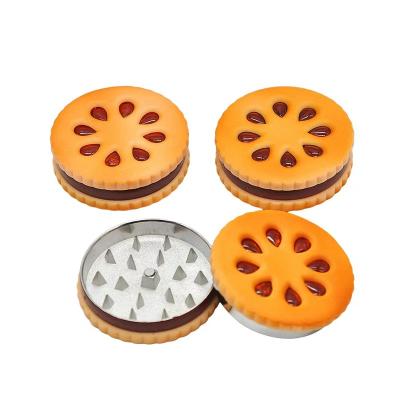 China Popular 2 Layers Cookie Shape 55mm Metal Herb Grinder Accessories Tobacco Gingerbread Cookie Smoking Grinder With Display Box for sale