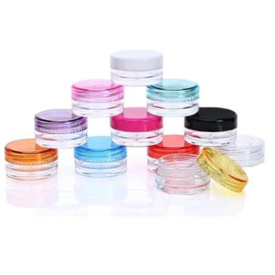 China Personal Care Sample 3g / 5g Mini Plastic Cosmetic Jar With Colorful Lid for sale