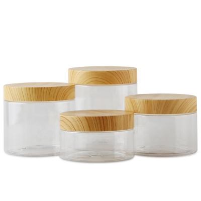 China 2021 Plastic Cosmetic Skin Care PET Jar With Wood Grain Plastic Cap for sale