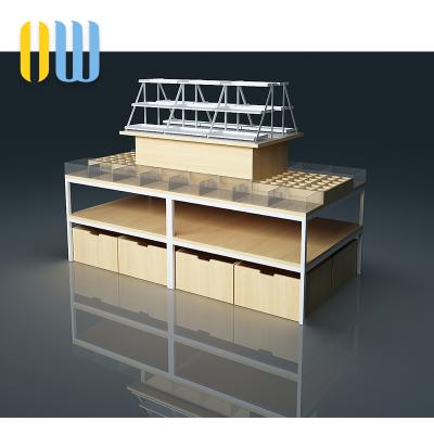 China Retail Store Commercial Deployment Pads Design Multi-Layer Wooden Display Rack For Food Display Housewares Display for sale