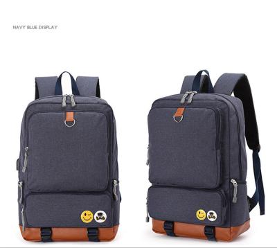 China Large Anti-theft Boxy School Backpack With Computer Compartment Smiley Badge Vintage Wide Shoulder Strap Laptop Backpack for sale