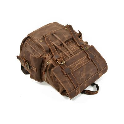 China Old Retro Boxy Camouflage Leather Belt Military Backpack Waterproof With Metal Buckle Drawstring Multi Compartment Travel Rucksack for sale